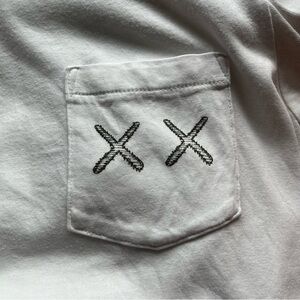 UNIQLO x KAWS sz S White Short Sleeve Pocket Tshirt XX Logo
